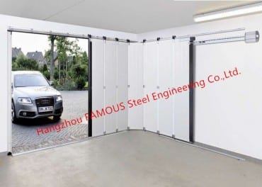 Portas deslizantes industriais horizontais seccionais con porta peonil de acceso para garaxe de taller