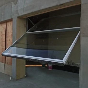 Système d'équilibrage de contrepoids de vitrage structurel de mur de verre d'inclinaison portes d'inclinaison