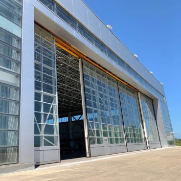 Heavy Duty Multi Section Toughened Glass Bi-Folding Sliding Hangar Doors