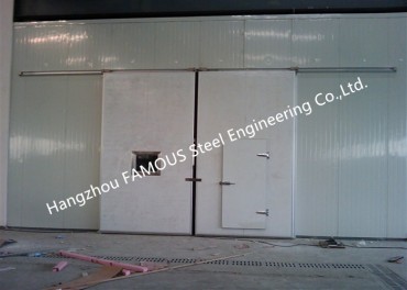 Didelės angos vertikalios stumdomos pramoninės garažo durys motorizuotos sunkios stumdomos durys su plieniniu vikšru