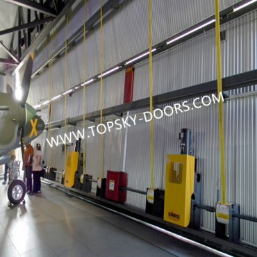 ໃໝ່ lifting Strap Hangar Doors Hydraulic Canopy Bi folding Doors for Aircraft buildings
